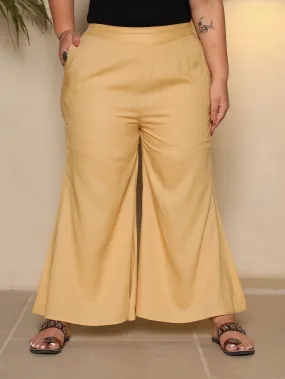 Jashvi Beige Modal Rayon Women Partially Elasticated Plus Size Bell Bottom Pants With Single Side Pocket