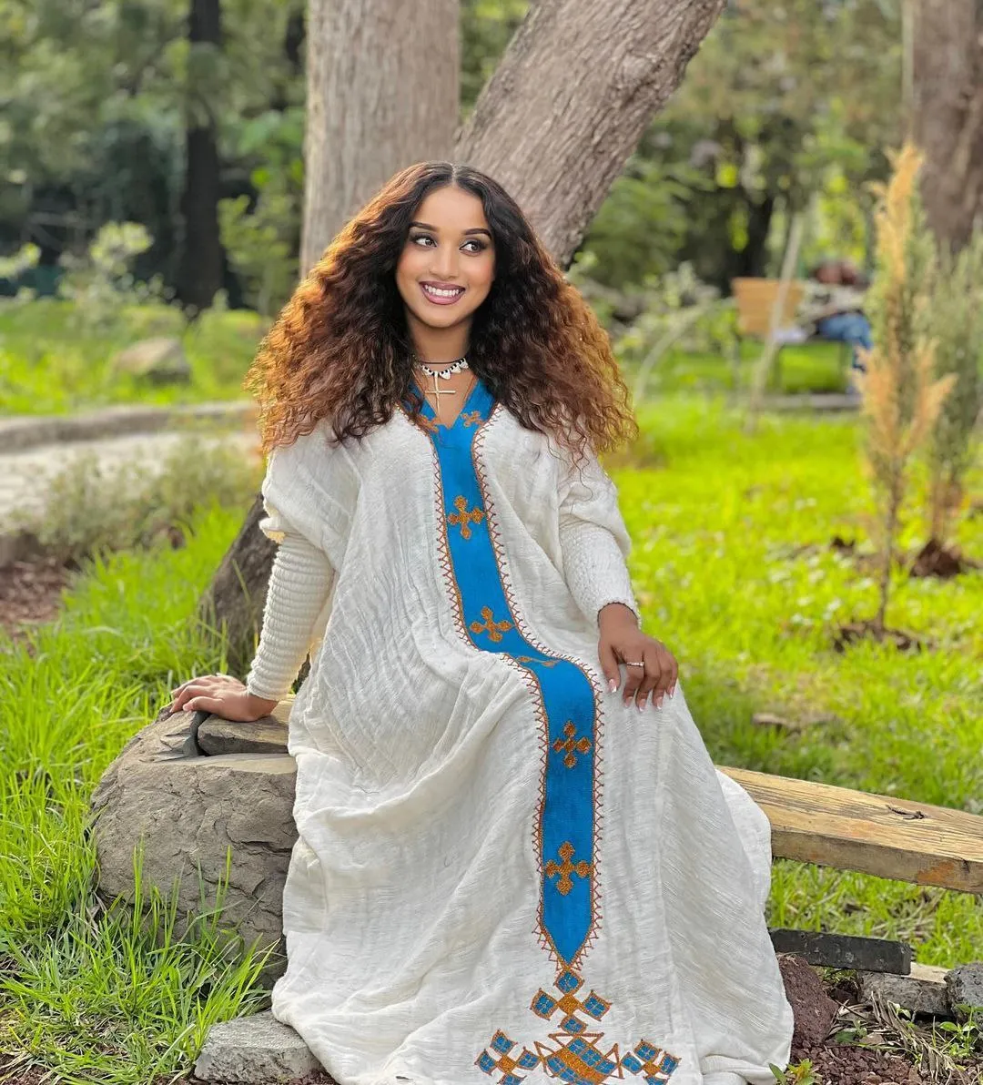 Pretty Habesha Dress with Blue Embroidery: for All Types of Cultural Occasions Ethiopian Dress